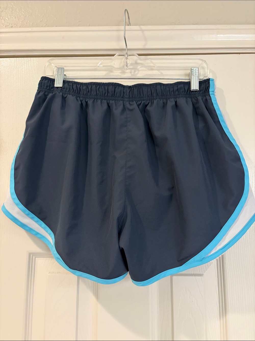Nike Dri-Fit Women's Navy Shorts with Light Blue Trim - Picture 2 of 3
